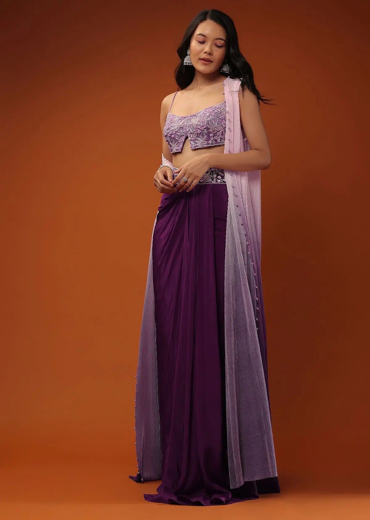 Imperial Purple Dhoti Skirt And A Crop Top In Sequins Embroidery, Paired With A Ombre Extended Jacket In Sleeveless Pehenawa