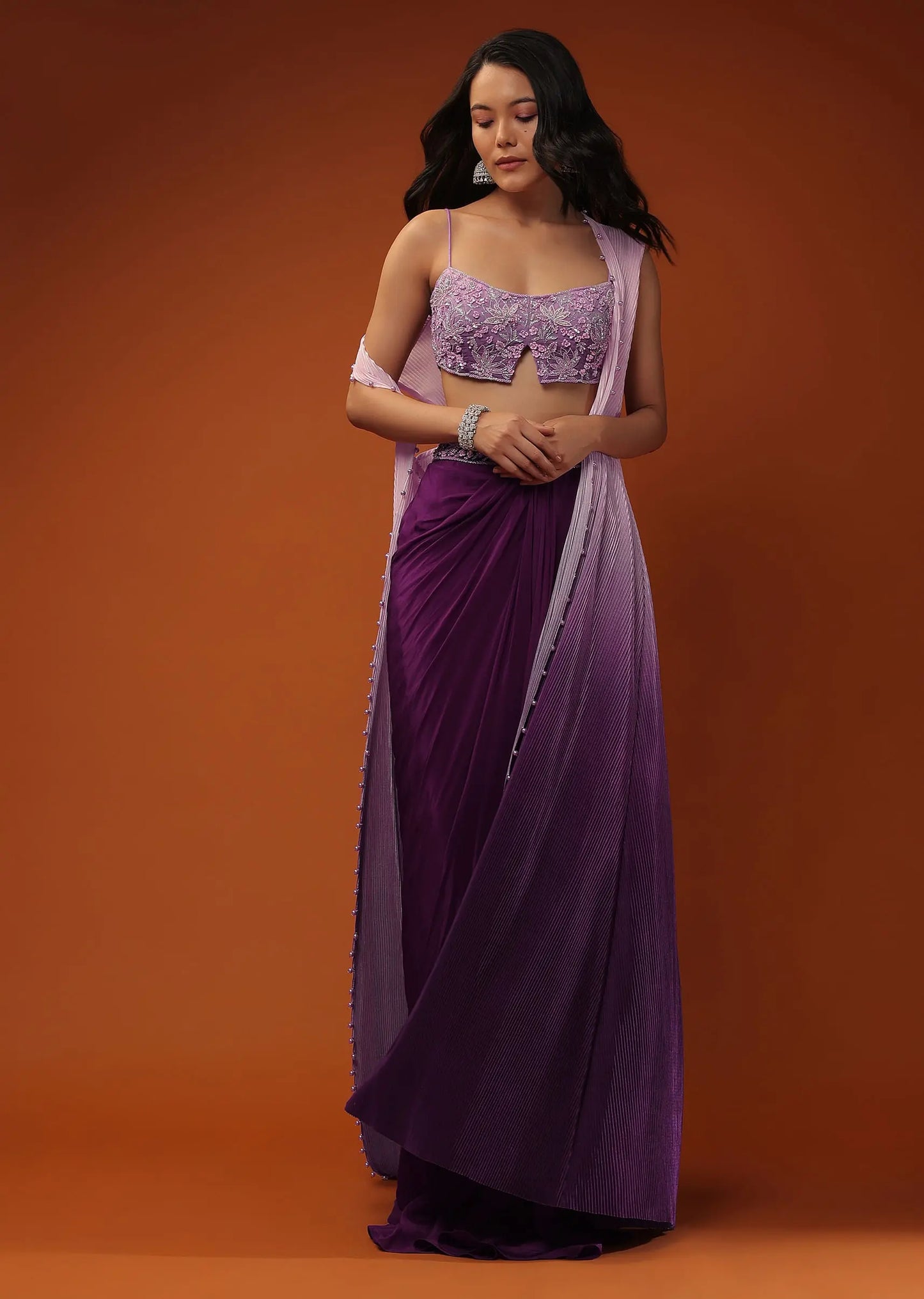 Imperial Purple Dhoti Skirt And A Crop Top In Sequins Embroidery, Paired With A Ombre Extended Jacket In Sleeveless Pehenawa